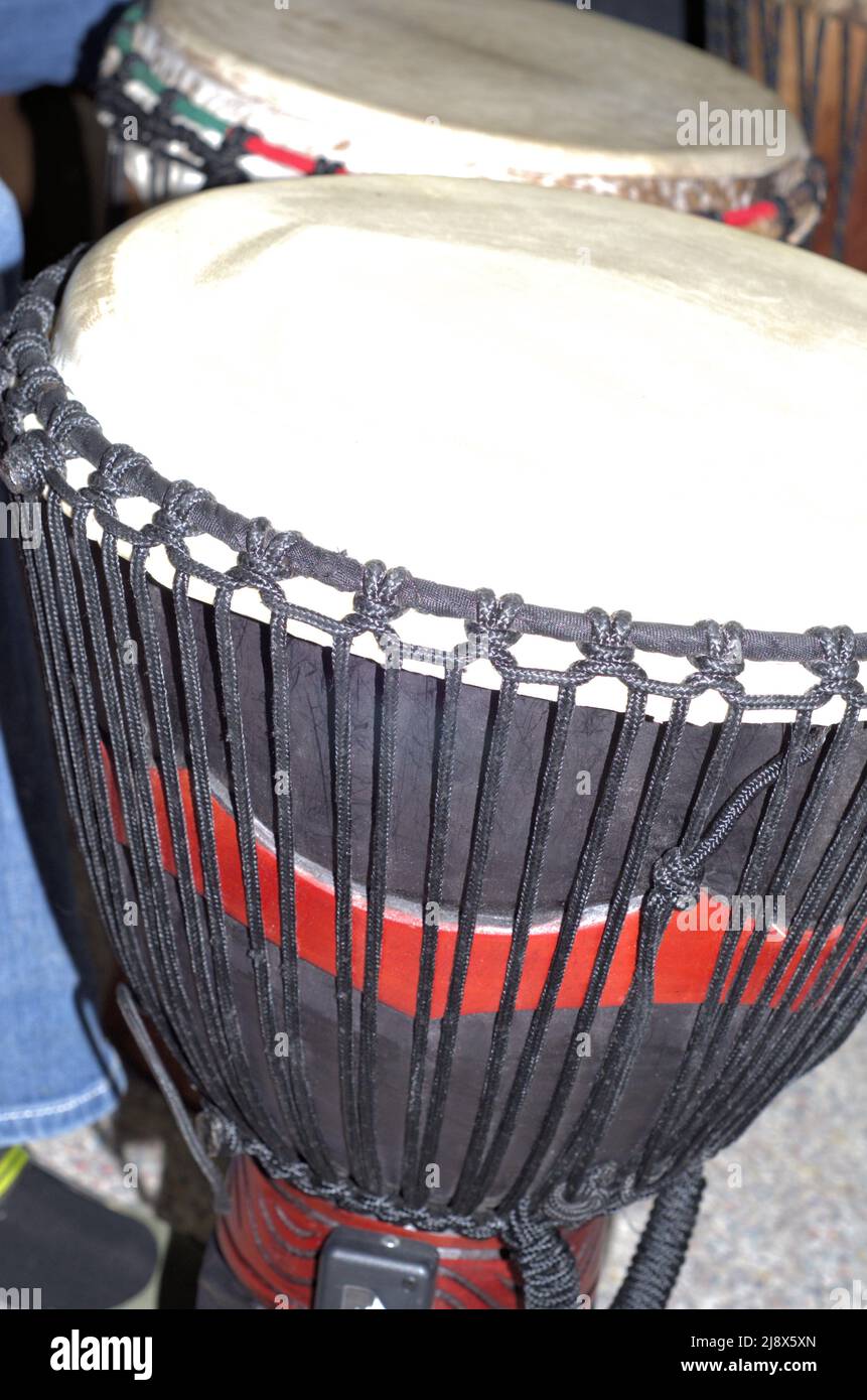 drums similar to those used in African culture, with rawhide top and astring decoration. Stock Photo