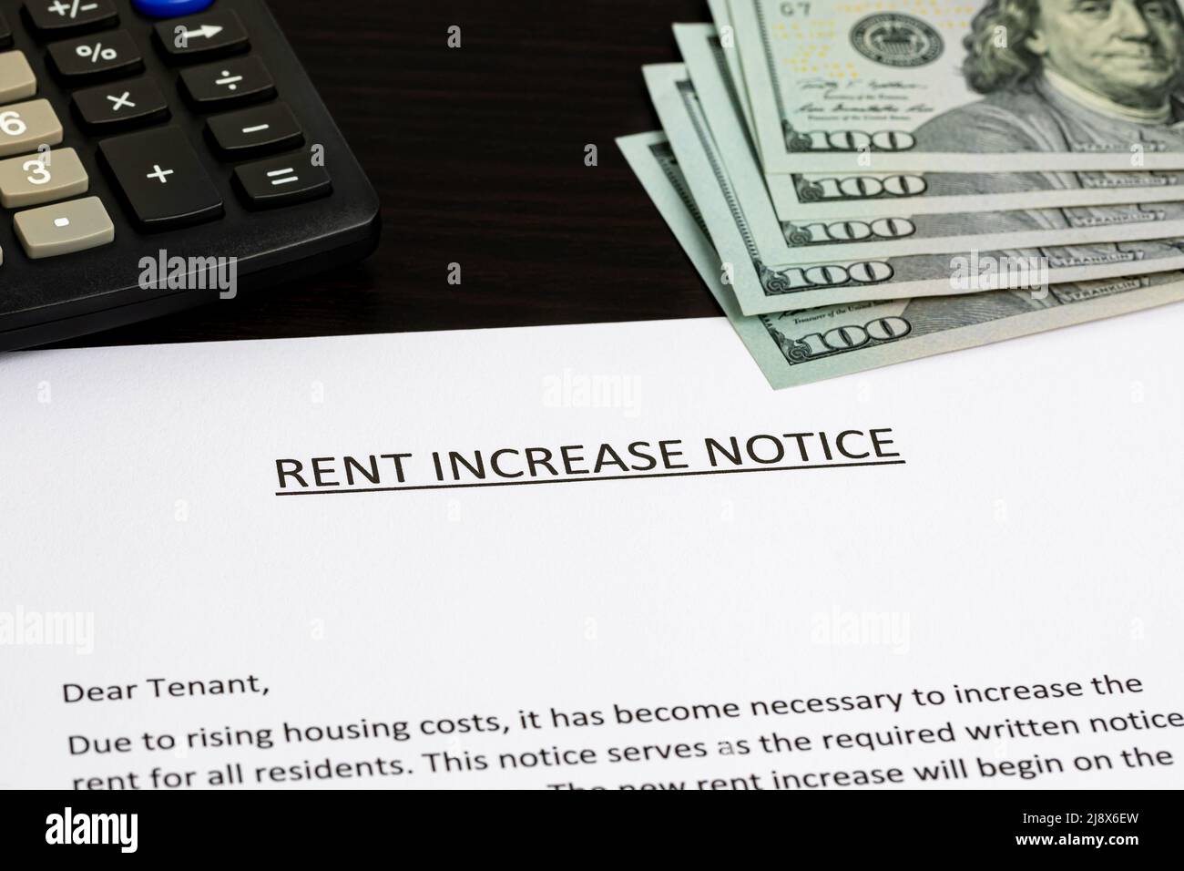 Rent increase notice. Rental assistance, housing market shortage, and monthly budget concept. Stock Photo