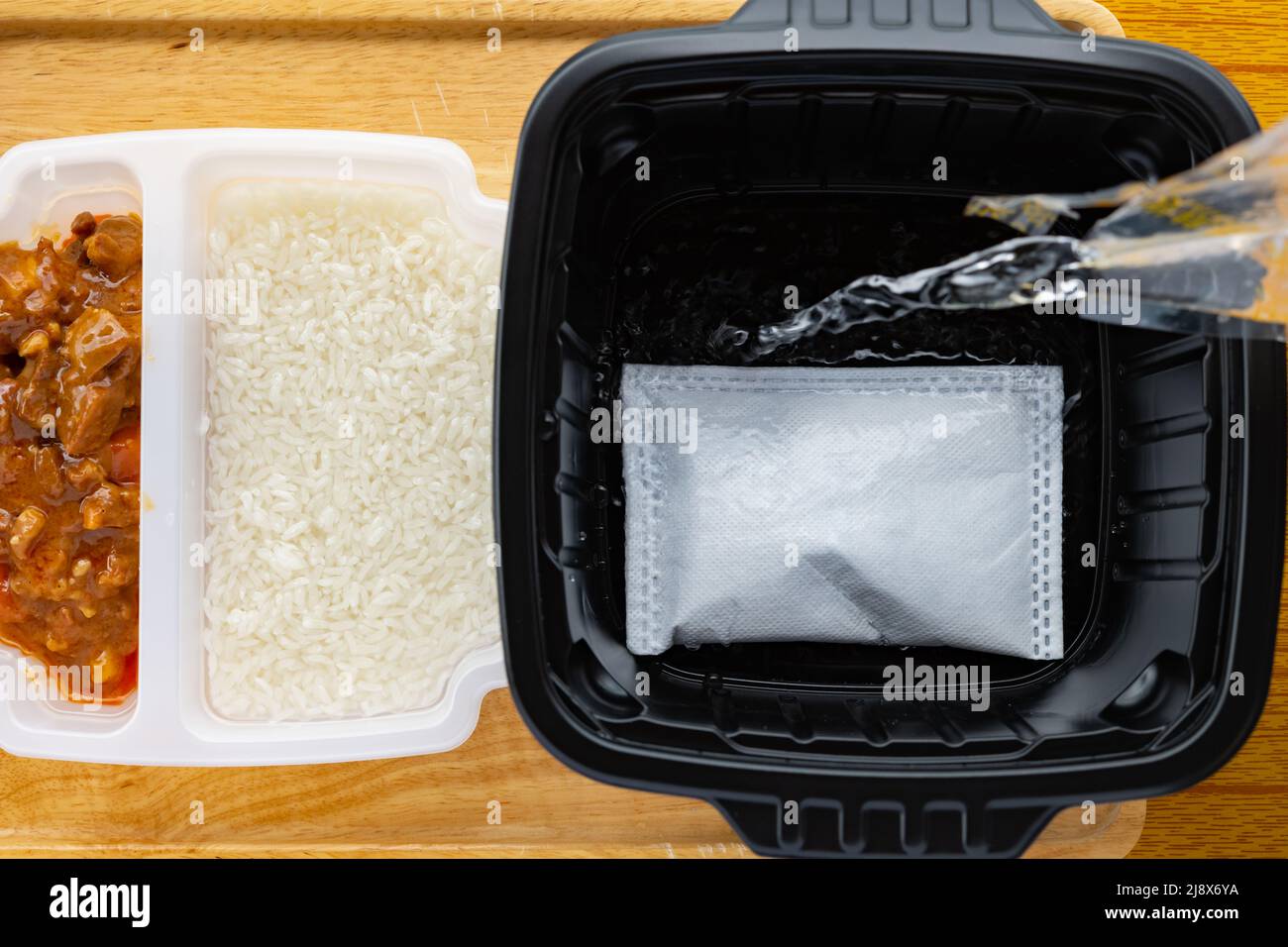 preparing self cooking fast food of rice with beef Stock Photo Alamy