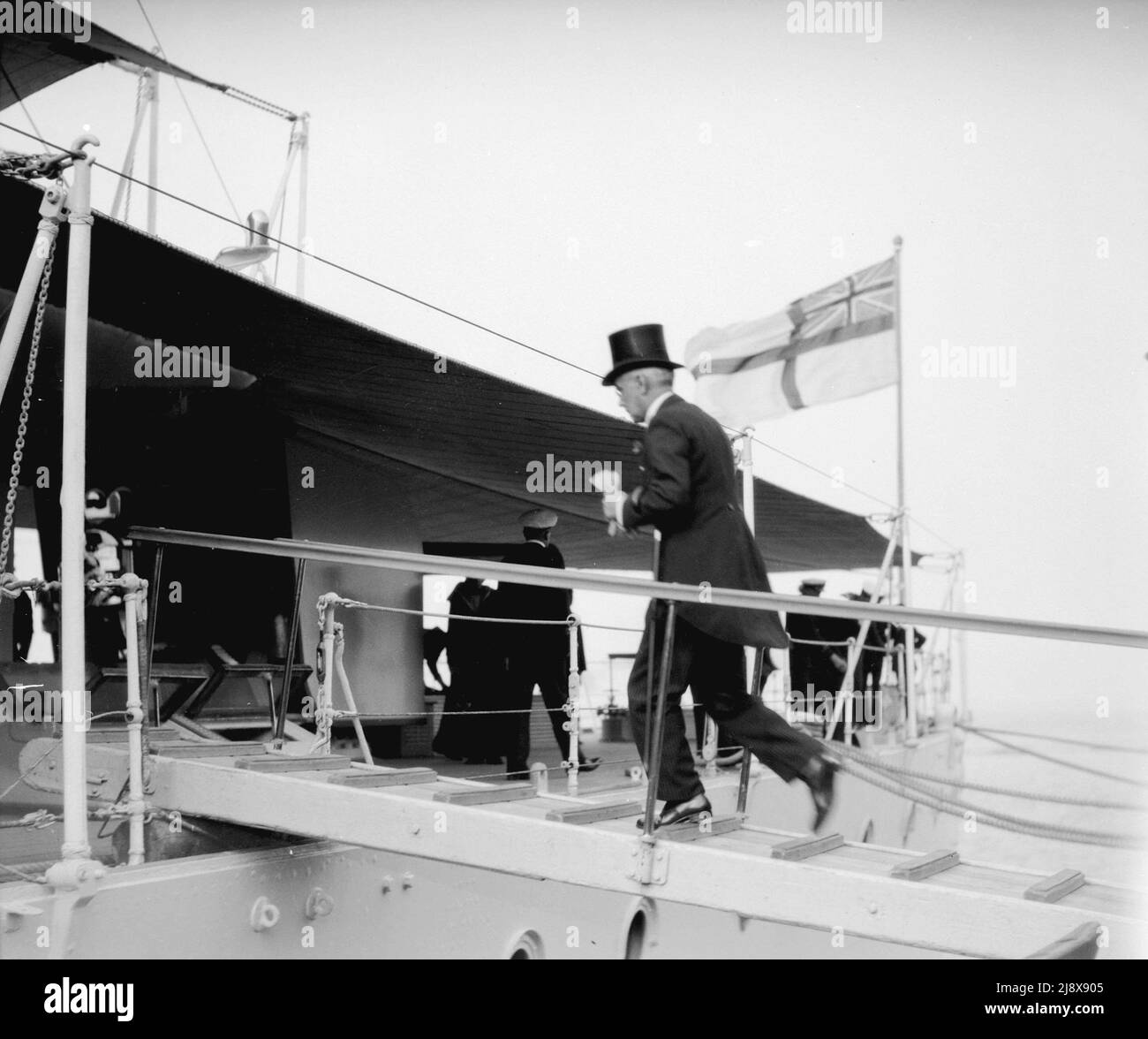 Visit of H.M.S. Despatch and H.M.S. Dauntless, Mayor Malkin boarding British warships  ca.  1930 Stock Photo