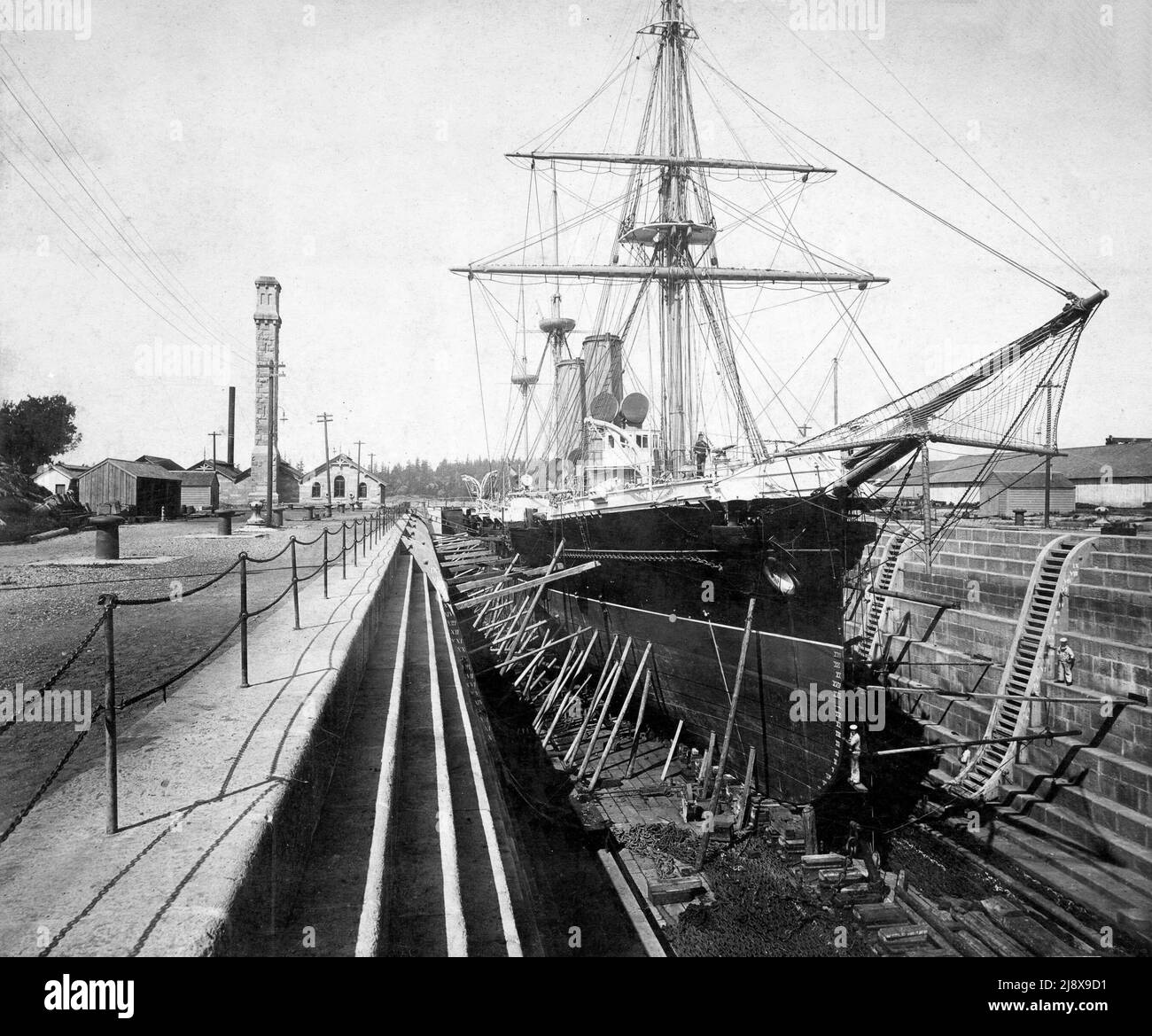 HMS Amphion in drydock at Esquimalt, British Columbia, Canada  ca.  between  1889 and  1890 Stock Photo