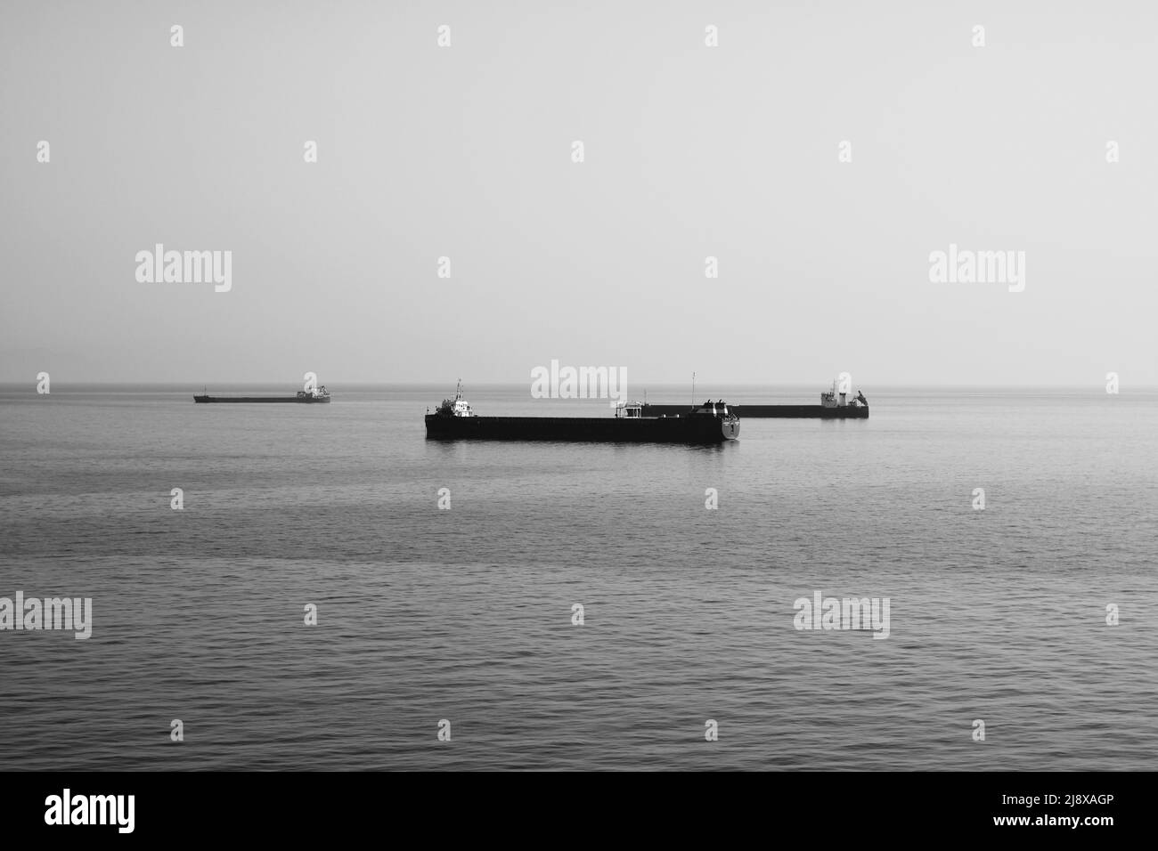 A black and white photo of the cargo ships Stock Photo