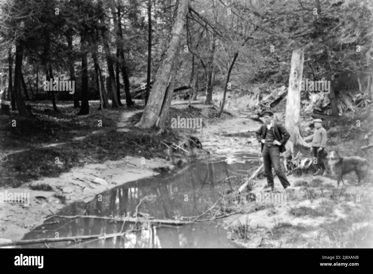 Hikers on the bank of Garrison Creek, Toronto  ca. early 1900s Stock Photo