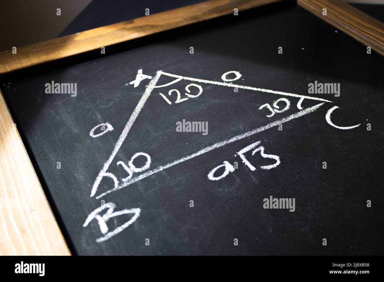 120/30/30 special triangle on the chalkboard Stock Photo