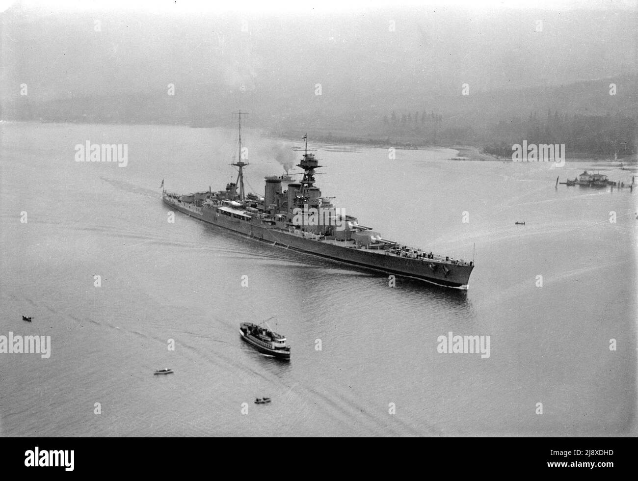 Aerial photograph of HMS Hood entering Vancouver Harbour  ca.  1924 Stock Photo