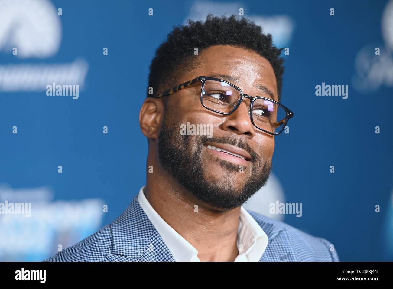 Nate Burleson attends the Paramount Upfront 2002 Post Party blue carpet