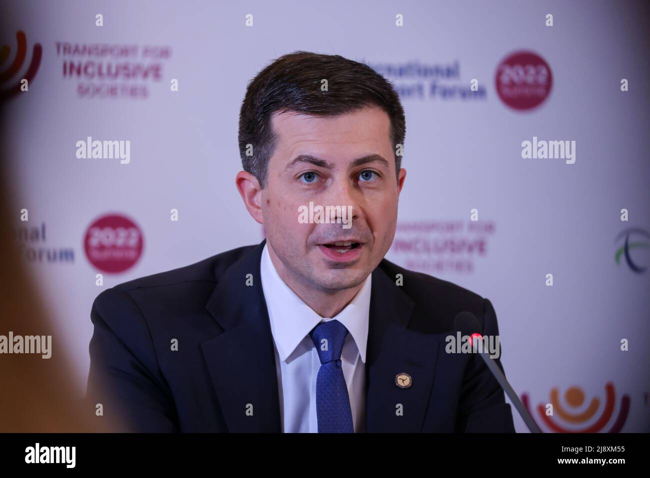 Leipzig, Germany. 18th May, 2022. Pete Buttigieg, Secretary of Transportation of the United States of America, addresses a joint call for assistance to Ukraine at the International Transport Forum. Some 600 experts are expected to attend the three-day International Transport Forum, including many transport ministers from the 63 member countries of the OECD's International Transport Forum (ITF). One focus this year should be Ukraine, with its blocked trade routes and infrastructure destroyed in the war. Credit: Jan Woitas/dpa/Alamy Live News Stock Photo