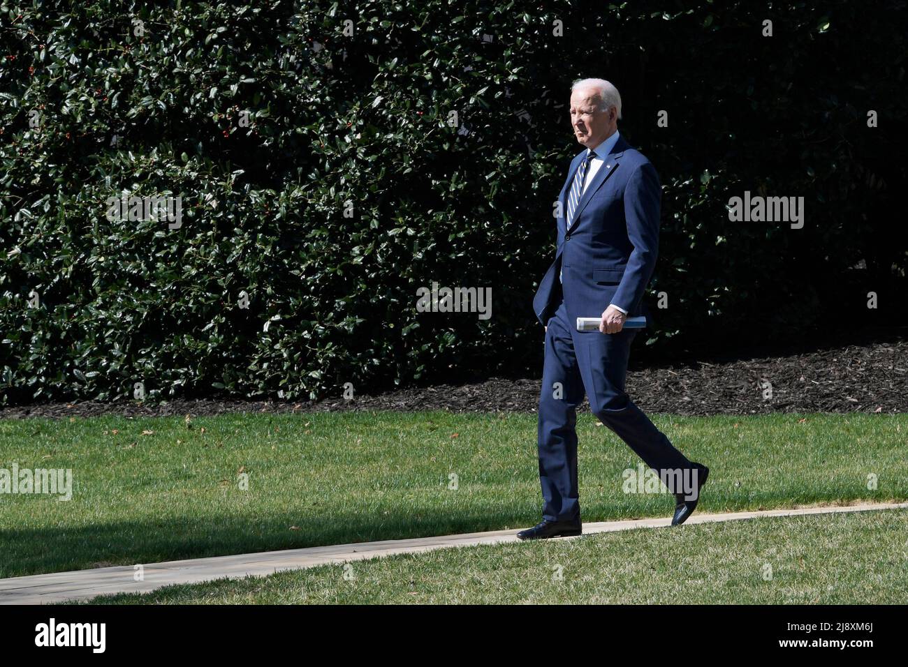 US President Joe Biden walks to Marine 1 en route to Joint Base Andrews at South Lawn/White House in Washington. Stock Photo