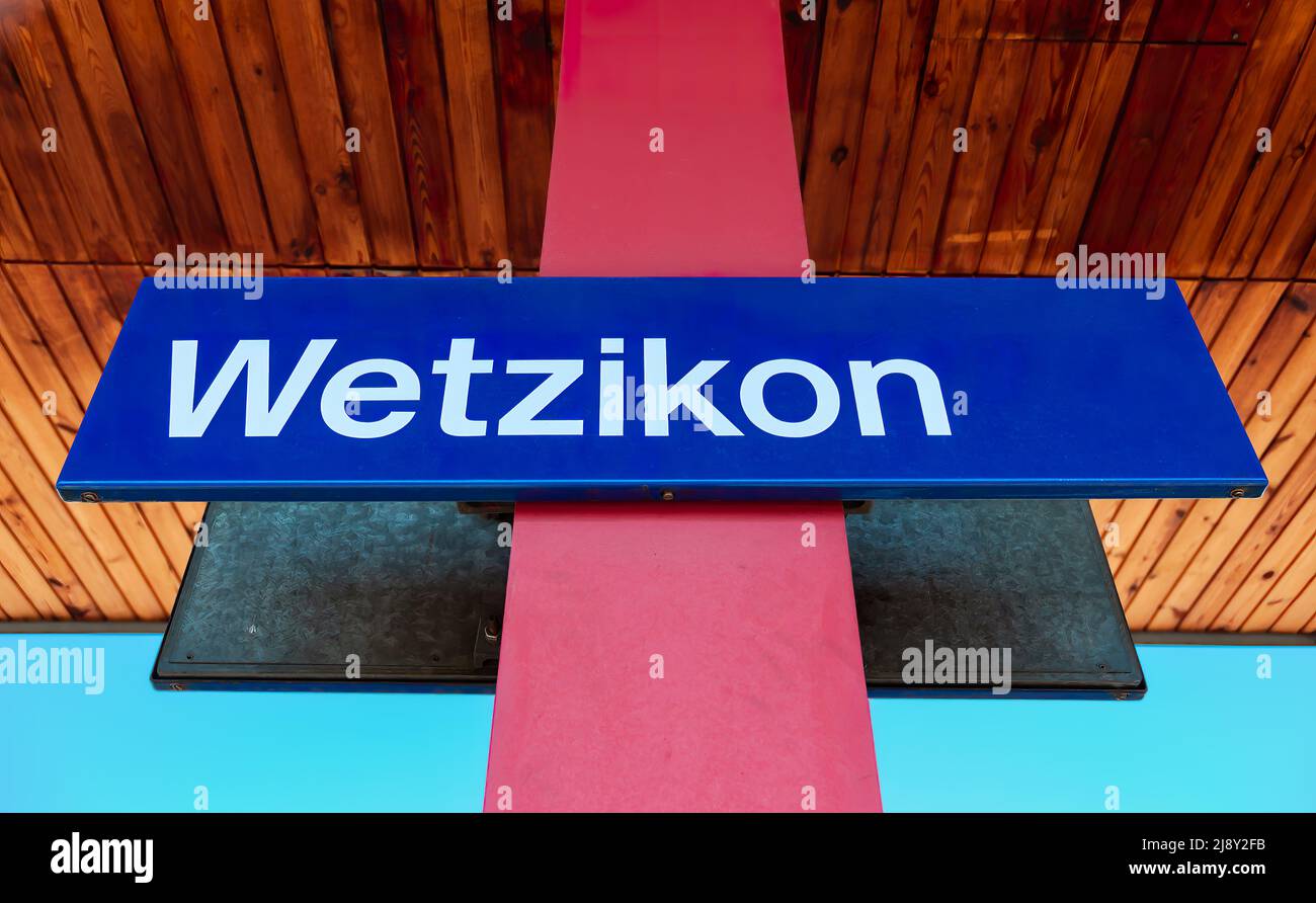 Railway station board in Wetzikon, the largest municipality in the district of Hinwil in the Swiss canton of Zurich. Stock Photo