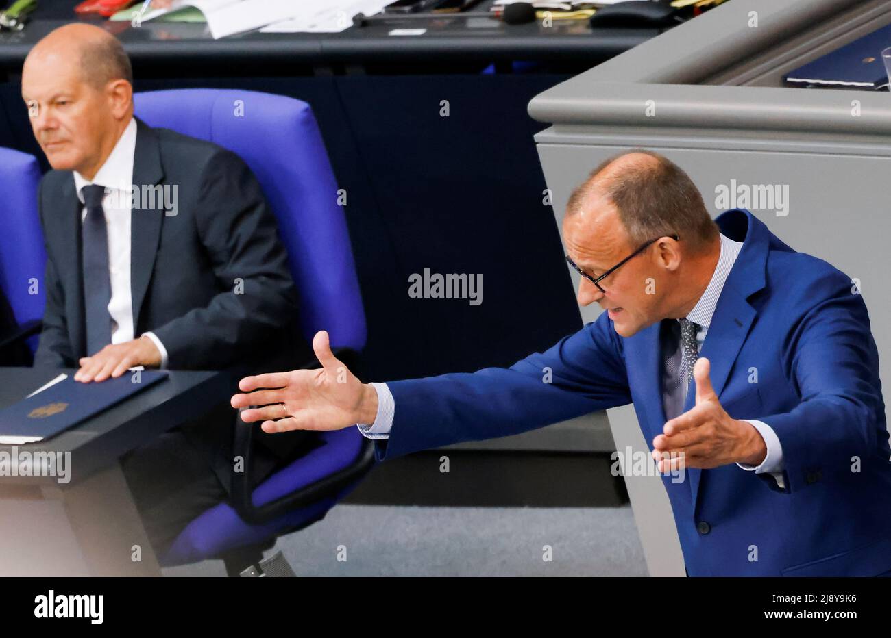 Leader of Germany's Christian Democratic Union (CDU) Friedrich Merz speaks as German Chancellor Olaf Scholz listens during a session of Germany's lower house of parliament, the Bundestag, in Berlin, Germany, May 19, 2022. REUTERS/Hannibal Hanschke Stock Photo