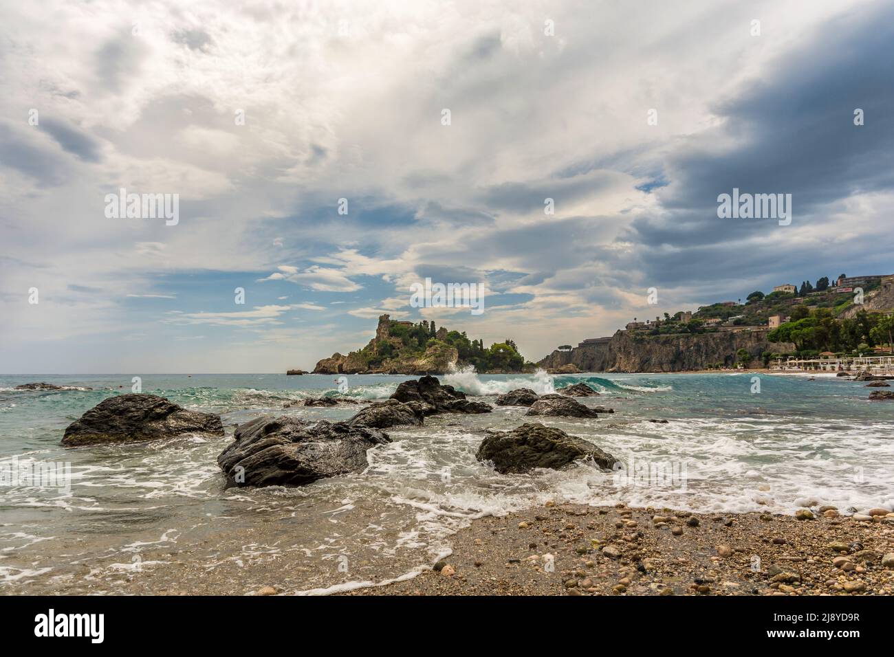 Rocky coast of Sicily at Isola Bella near Taormina Stock Photo