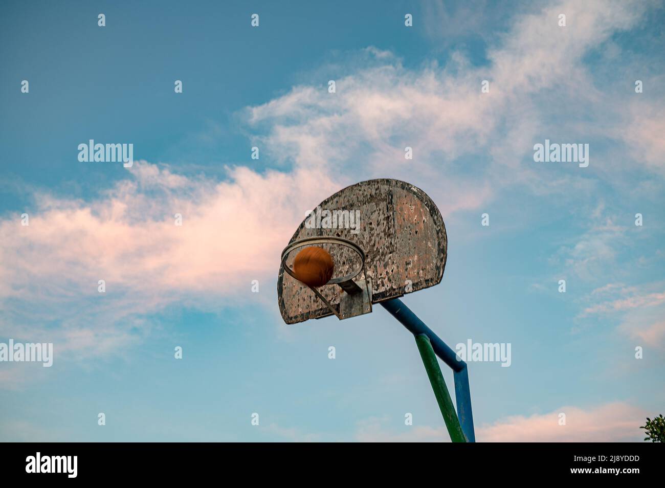Basketball hoop shot from low angle with skyline Stock Photo Alamy