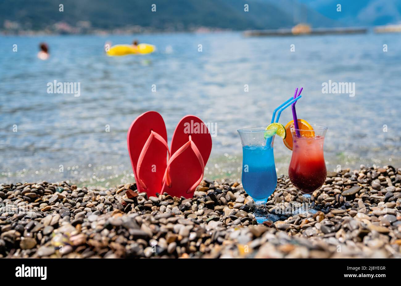 Beach background with a cocktail by the sea. Travel people vacation summer drink concept Stock Photo