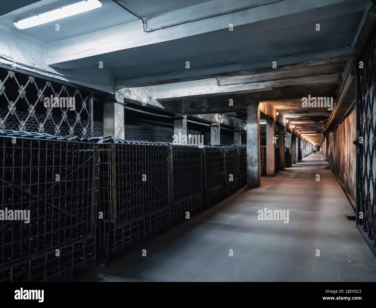 Underground wine cellar for storage and maturation of wine in glass