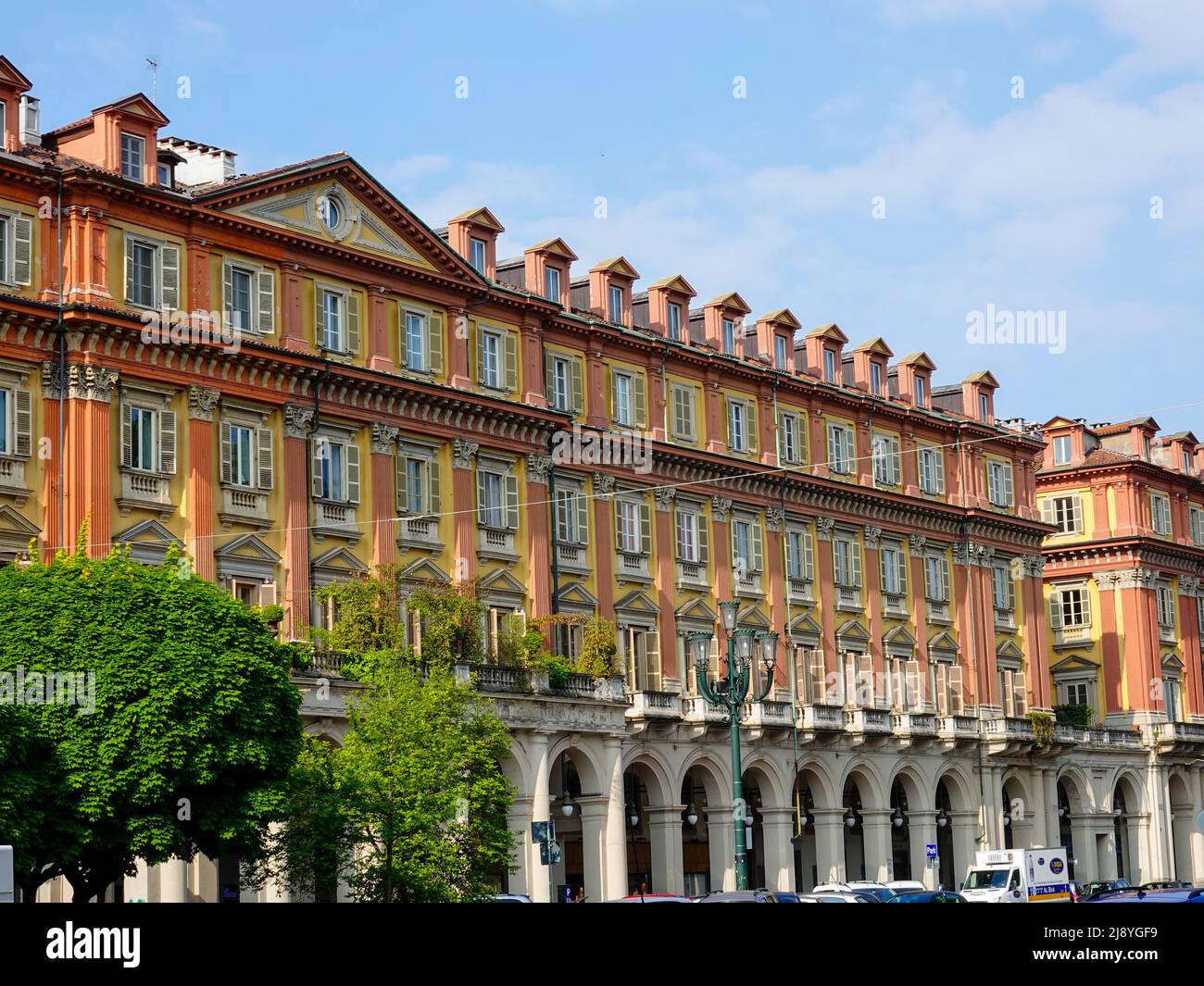 Typical architecture in the center of old, historic Turin, Italy, with arcade covered walkways. Stock Photo