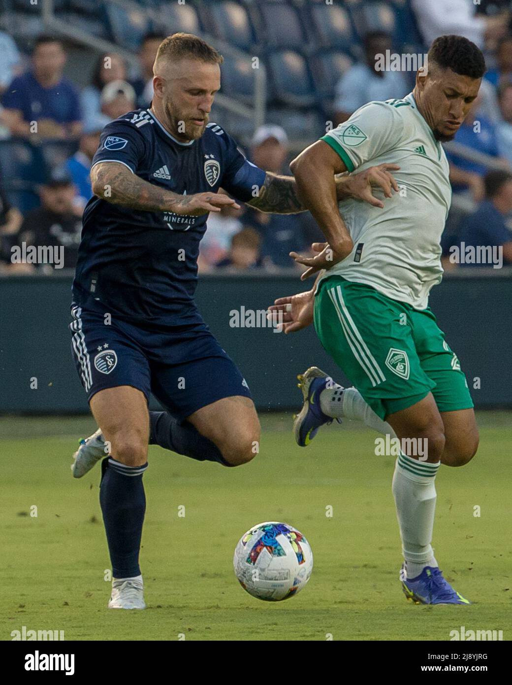 Kansas City, Kansas, USA. 17th May, 2022. Sporting KC forward Johnny Russell #7 (l) is on the offense against and Colorado Rapids midfielder Bryan Acosta #21 (r) during the first half of the game. (Credit Image: © Serena S.Y. Hsu/ZUMA Press Wire) Stock Photo