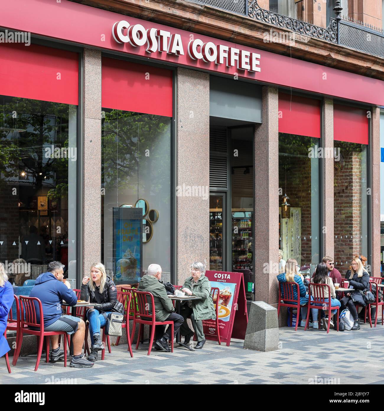 Customers sitting outside a Costa coffee shop, Sauchiehall Street