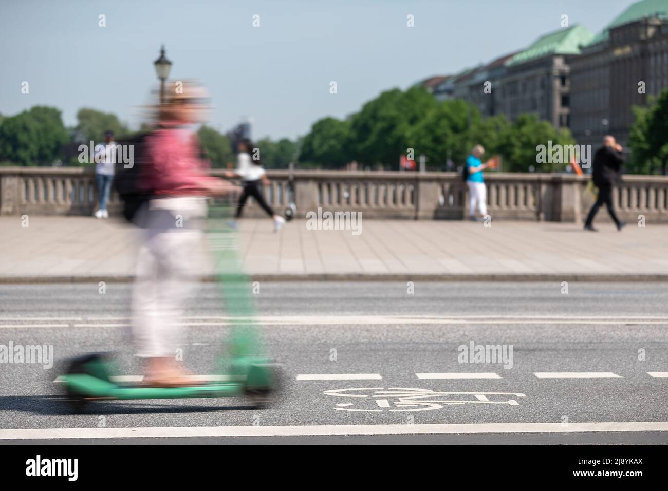 electric scooter on the bike path in blur Stock Photo