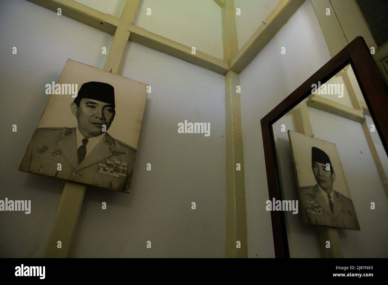 Printed photo of Indonesian first president Soekarno in a bedroom where he spent his exile time several years during colonial period at a house which is now a museum in Bengkulu, Indonesia. Stock Photo