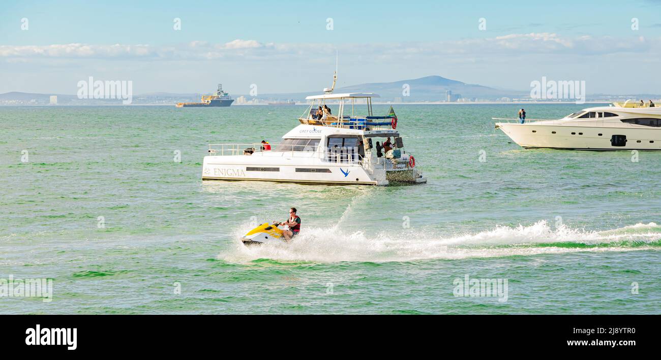 Cape Town, South Africa - May 12, 2022: Leisure boats on the water in Table Bay Stock Photo