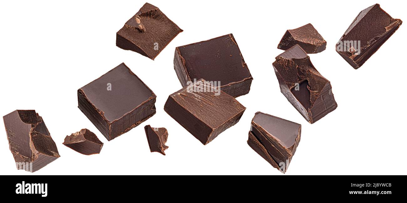 Falling chocolate pieces isolated on white background Stock Photo