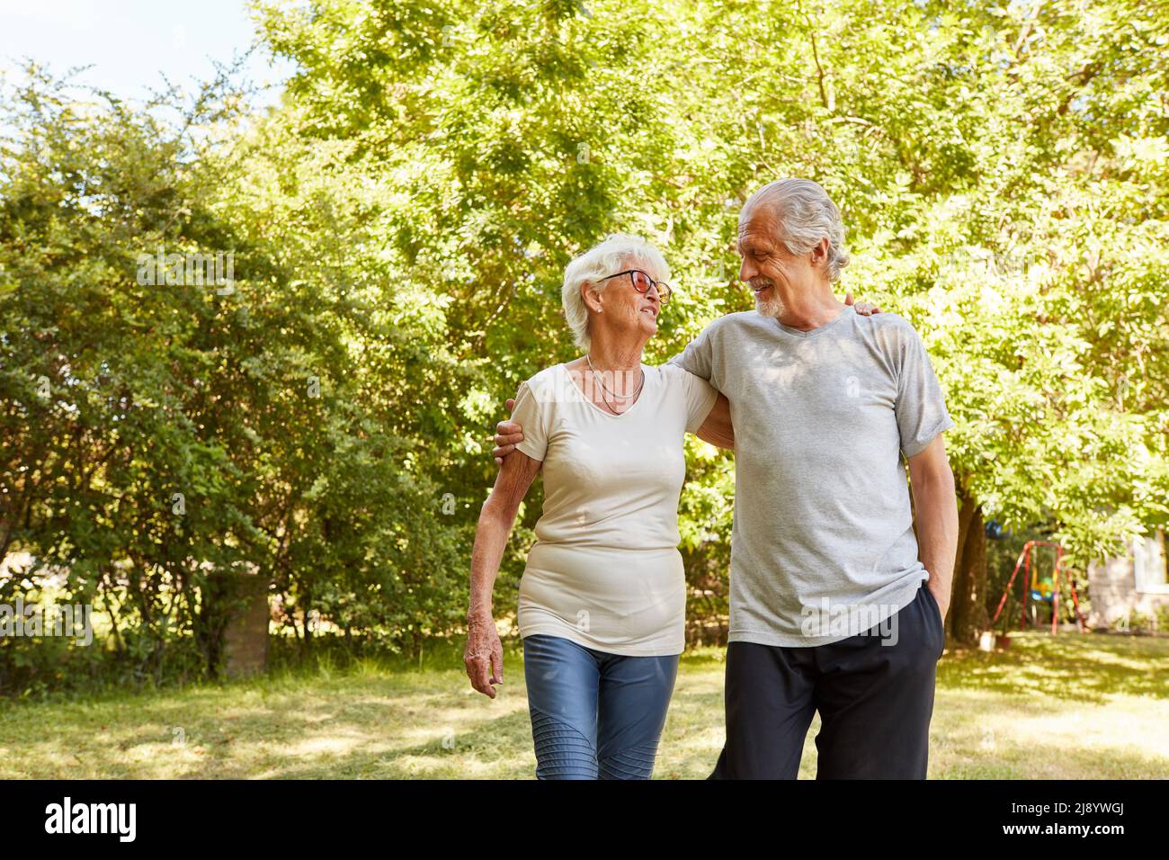 Senior citizens walk in park hi-res stock photography and images - Alamy