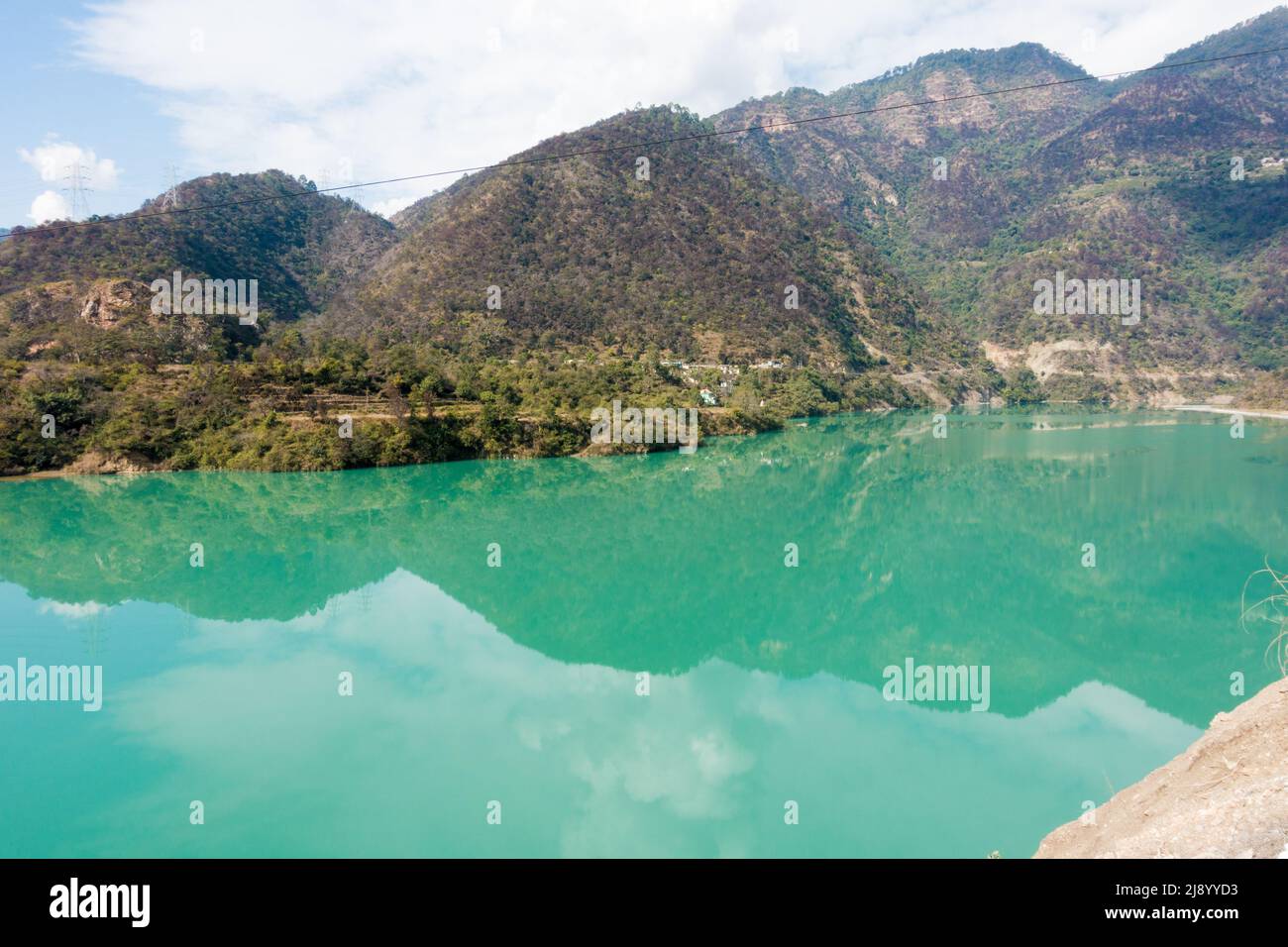 Alaknanda River between Srinagar and Rudraprayag in the Garhwal Region of Uttarakhand, India. 21st January 2022. Stock Photo