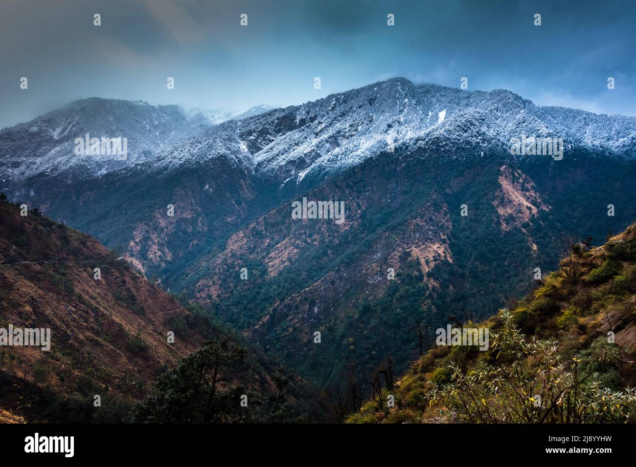 A beautiful shot of Snow covered mountains in the Okhimath district of Chamoli garhwal, Uttrakhand. India. Stock Photo