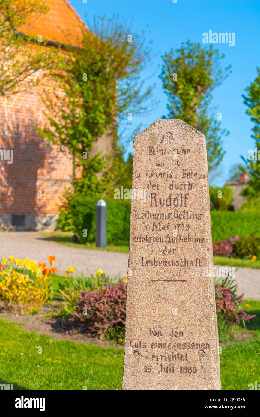 Abolition of serfdom in the 18th century. memorial stone at St. Katharinen Church,Gelting, Angeln, Schleswig-Holstein, Northern Germany, Europe Stock Photo