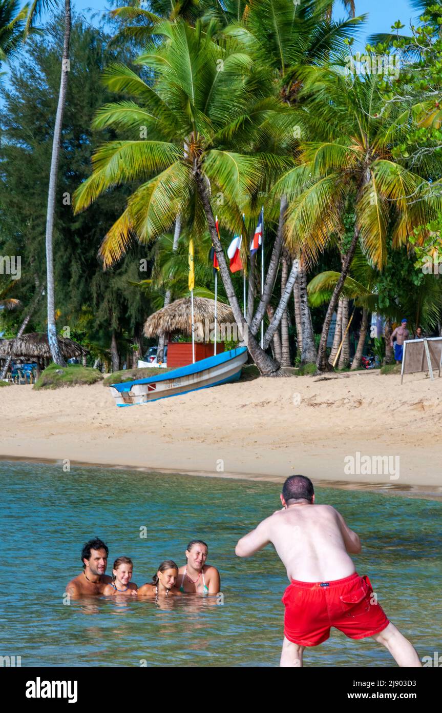 Las Terrenas beach, Samana, Dominican Republic, Carribean, America. Tropical Caribbean beach with coconut palm trees.  This white-sand beach stretches Stock Photo
