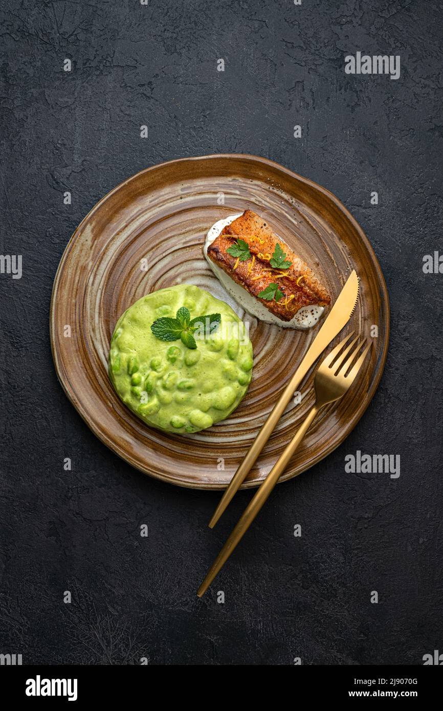Pan fried ocean perch with edamame, restaurant dish Stock Photo Alamy