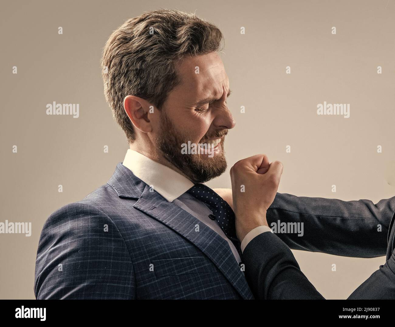 Fighting has been going on. Businessman defend punch. Fist fighting. Physical assault Stock Photo