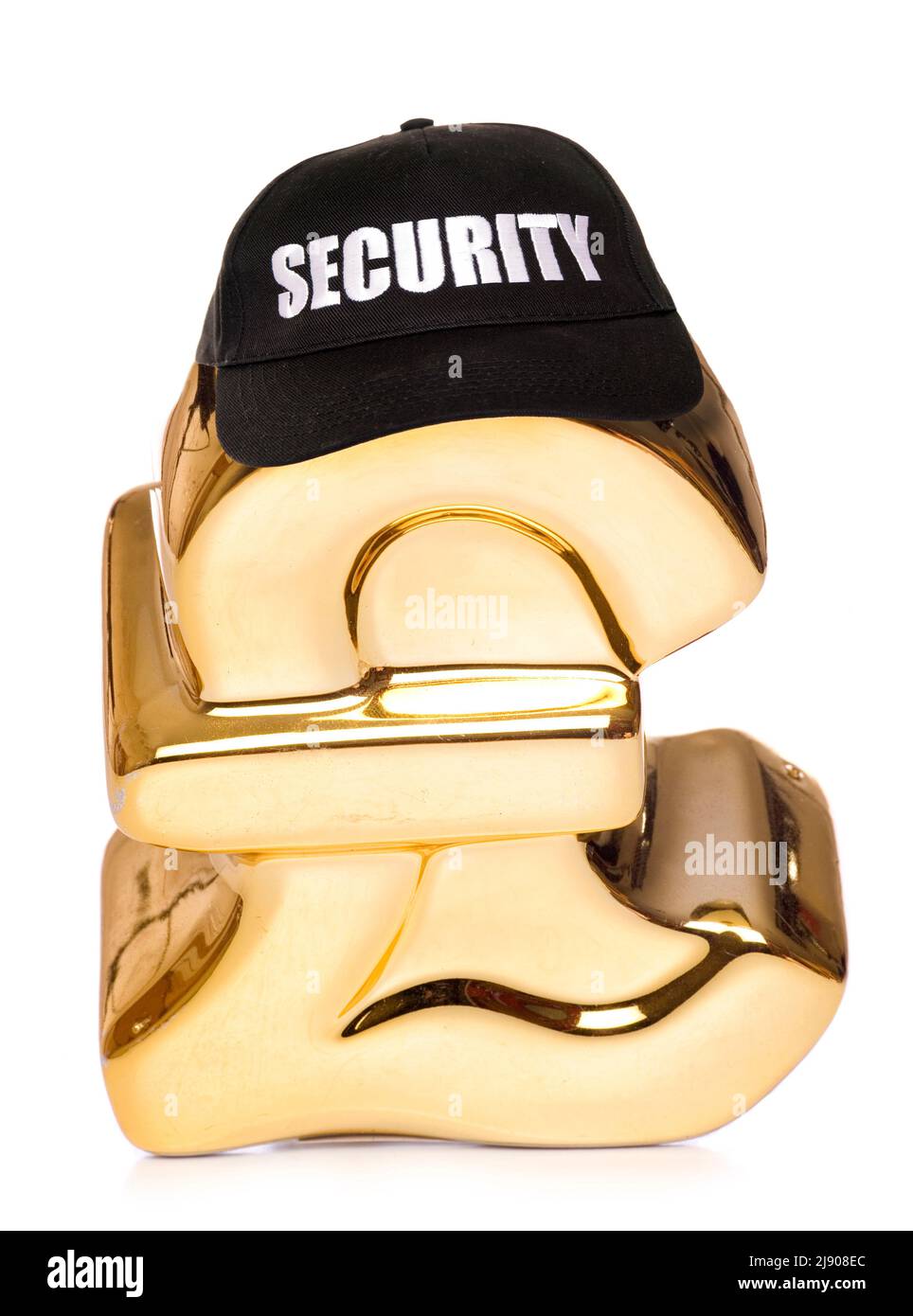 gold pound money box wearing a security hat isolated on a white background Stock Photo