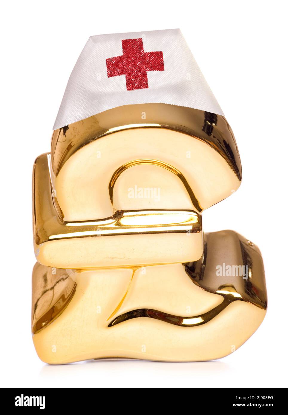 gold pound money box with medical hat studio cutout Stock Photo