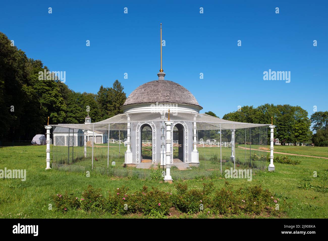 Village of Stepanovskoe-Volosovo. Russia, Tver region. August 9, 2021: A bird house for pheasants and peacocks in the farm yard Stock Photo