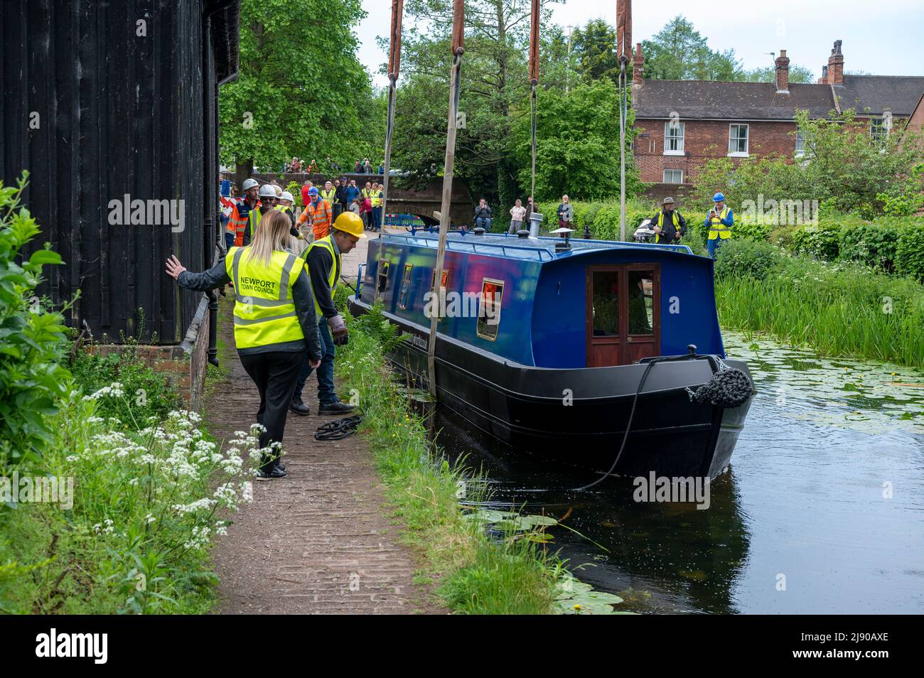After almost 80 years boats are finally back on the Shrewsbury & Newport Canal with the launch of a narrowboat at the canal basin in the Shropshire town of Newport. Stock Photo