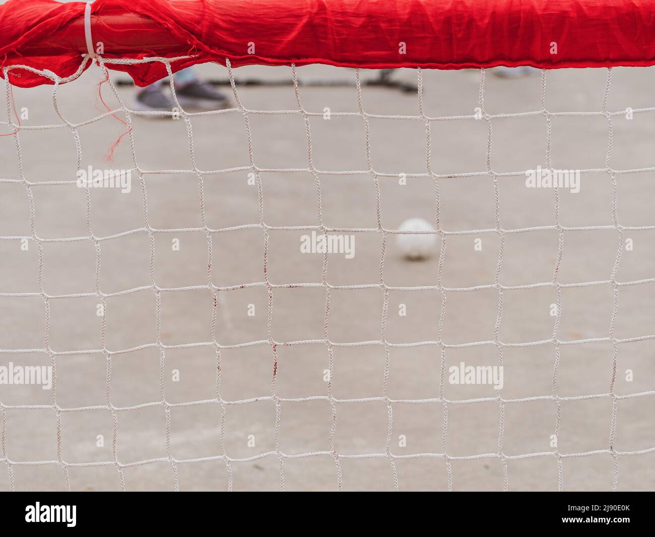 Floorball goal ready for training. Children playing outdoor in spring