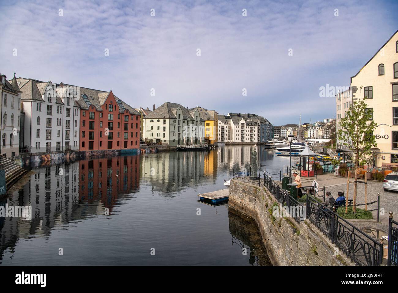 Ålesund is a port town on the west coast of Norway, at the entrance to the Geirangerfjord. It’s known for the art nouveau architectural style i Stock Photo