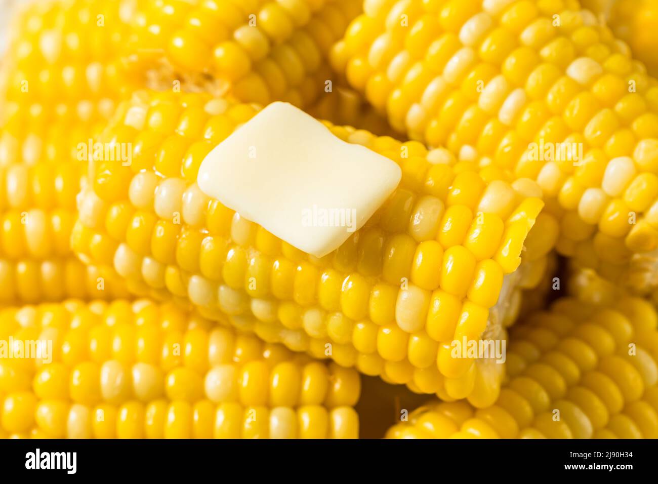 Homemade Steamed Sweet Corn on the Cob with Butter Stock Photo