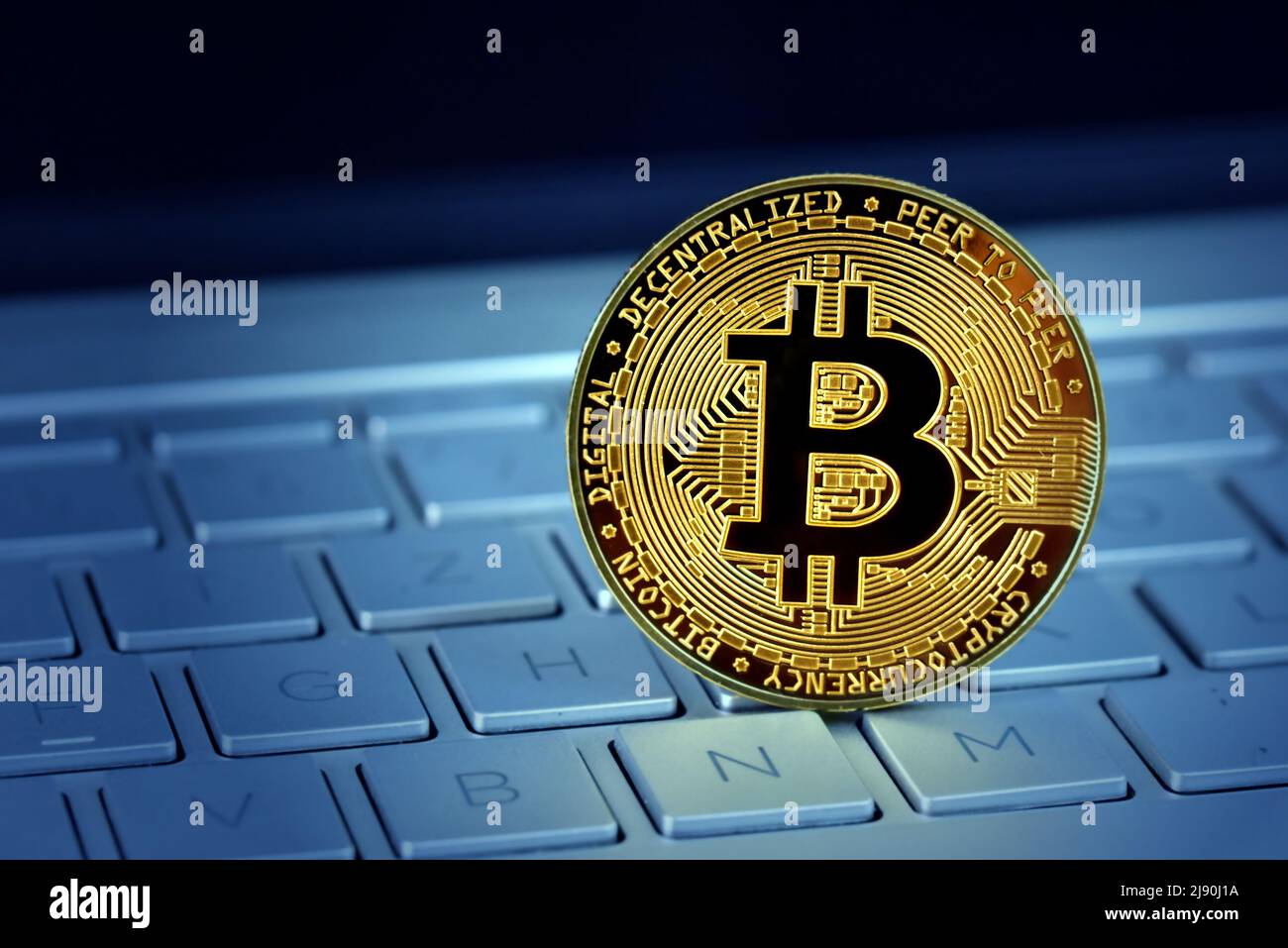 golden bitcoin with pc keyboard Stock Photo