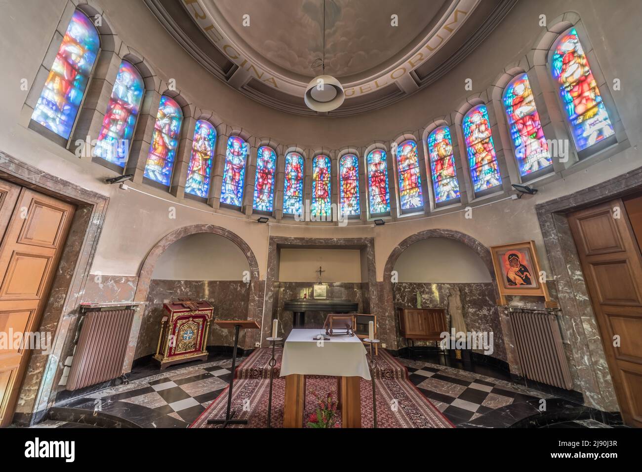 Jette, Brussels Capital Region - Belgium - 10 10 2019 Modern Gothic interior design of the Our Lady of Lourdes Roman Catholic church of Jette Stock Photo