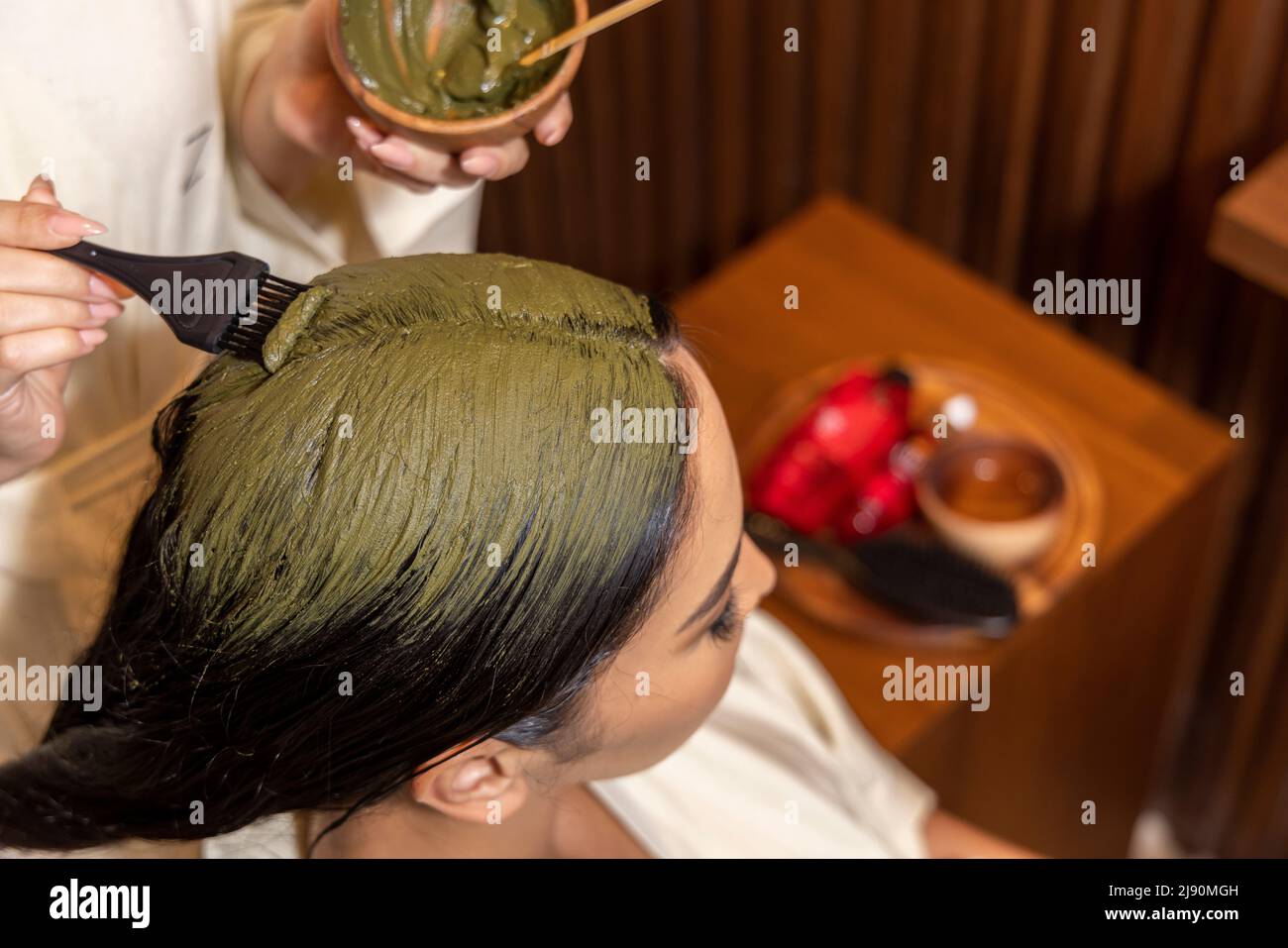 Matcha hair treatment for women Stock Photo