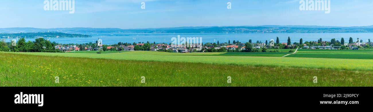 Scherzingen, Switzerland - May 15, 2022: Panoramic view of village of Scherzingen at lake Constance - Bodensee lake. Stock Photo