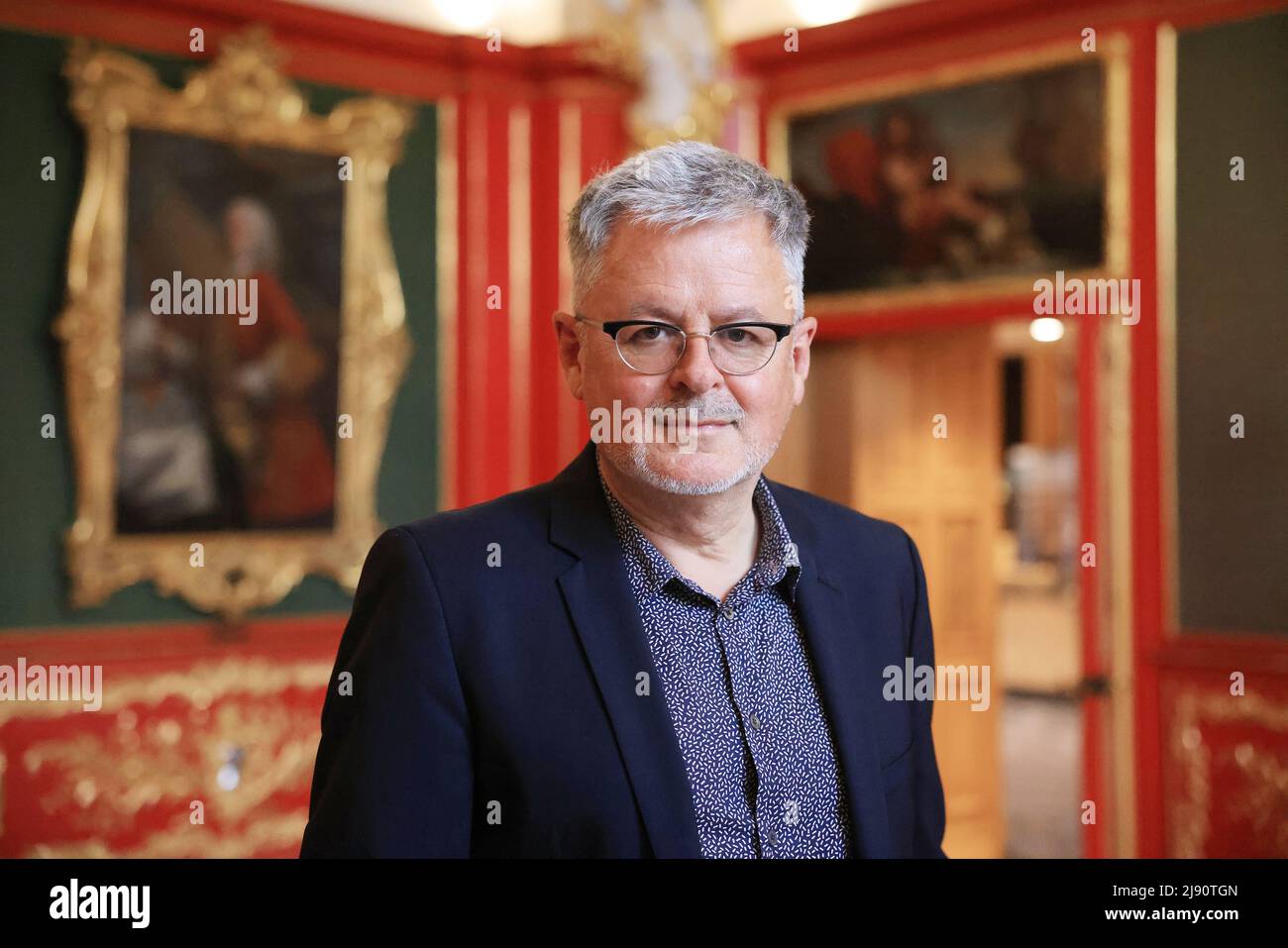 Aachen, Germany. 19th May, 2022. Christopher Clark, historian, stands in  the red room at City Hall. Many opponents of arms deliveries to Ukraine are  currently arguing with Christopher Clark's book "The Sleepwalkers" (