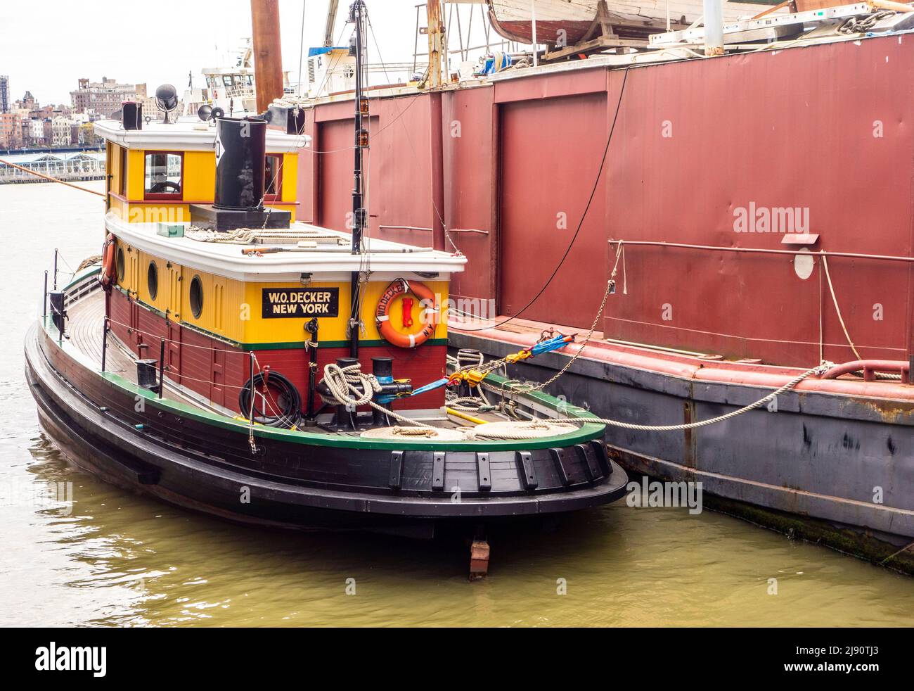 W.O. Decker, historic wooden tugboat at the South Street Seaport, New York City, New York, USA Stock Photo