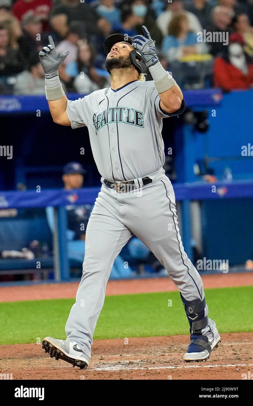 Seattle Mariner infielder Eugenio Suárez (28) rounds the bases and Seattle Mariner infielder Eugenio Suárez (28) rounds the bases and