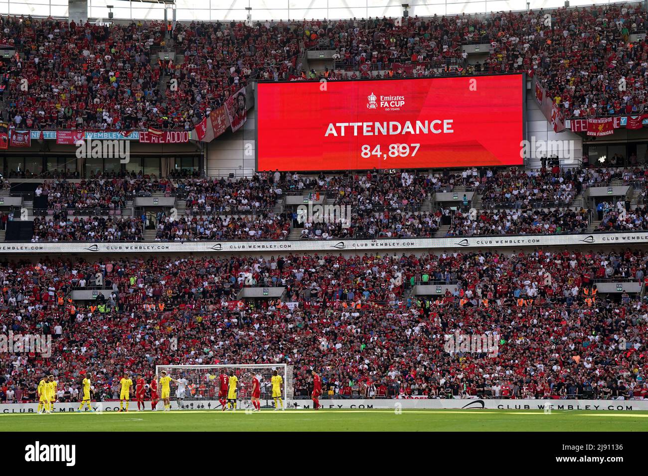 A big screen displays the official attendance of 84, 897 fans during