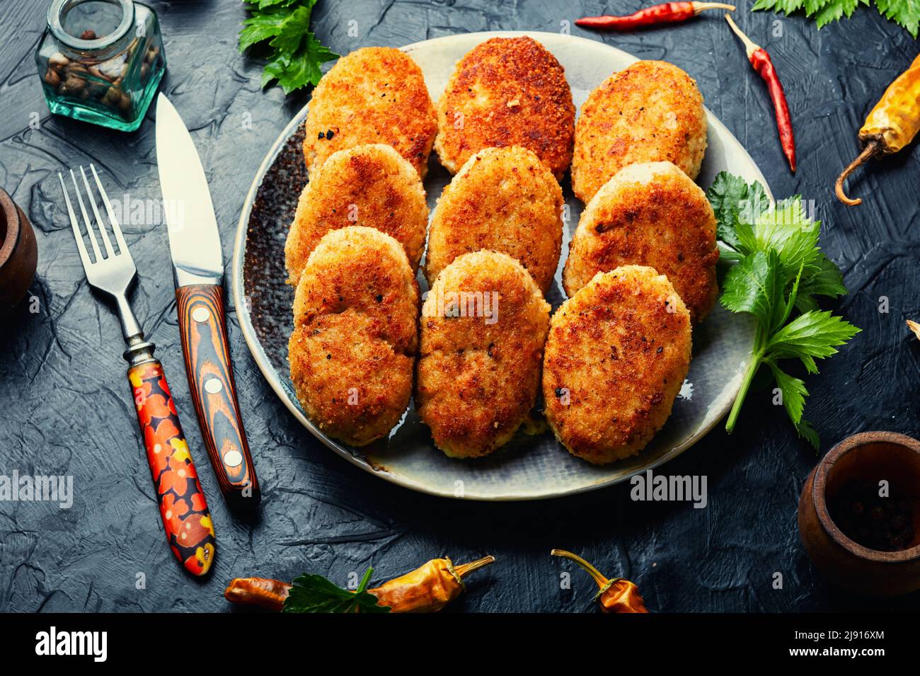 Homemade fried minced fish cutlets and fish steak Stock Photo