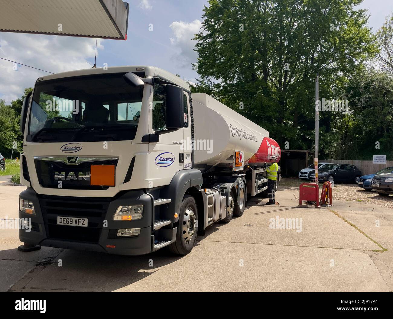 Hampshire, England, UK. 2022. Fuel tanker delivering fuel to a petrol