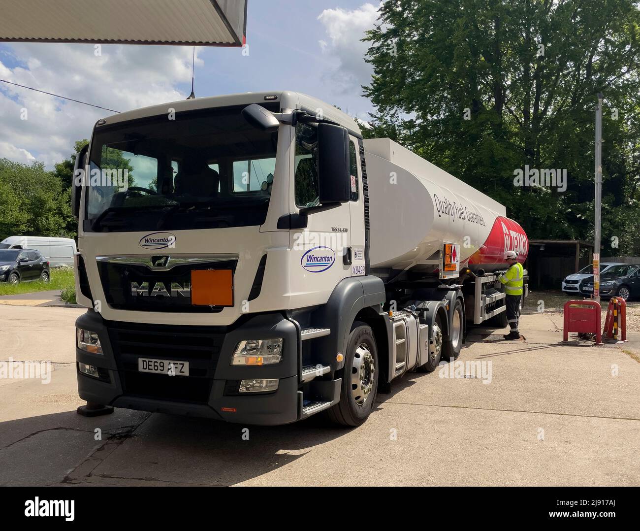 Hampshire, England, UK. 2022. Fuel tanker delivering fuel to a petrol
